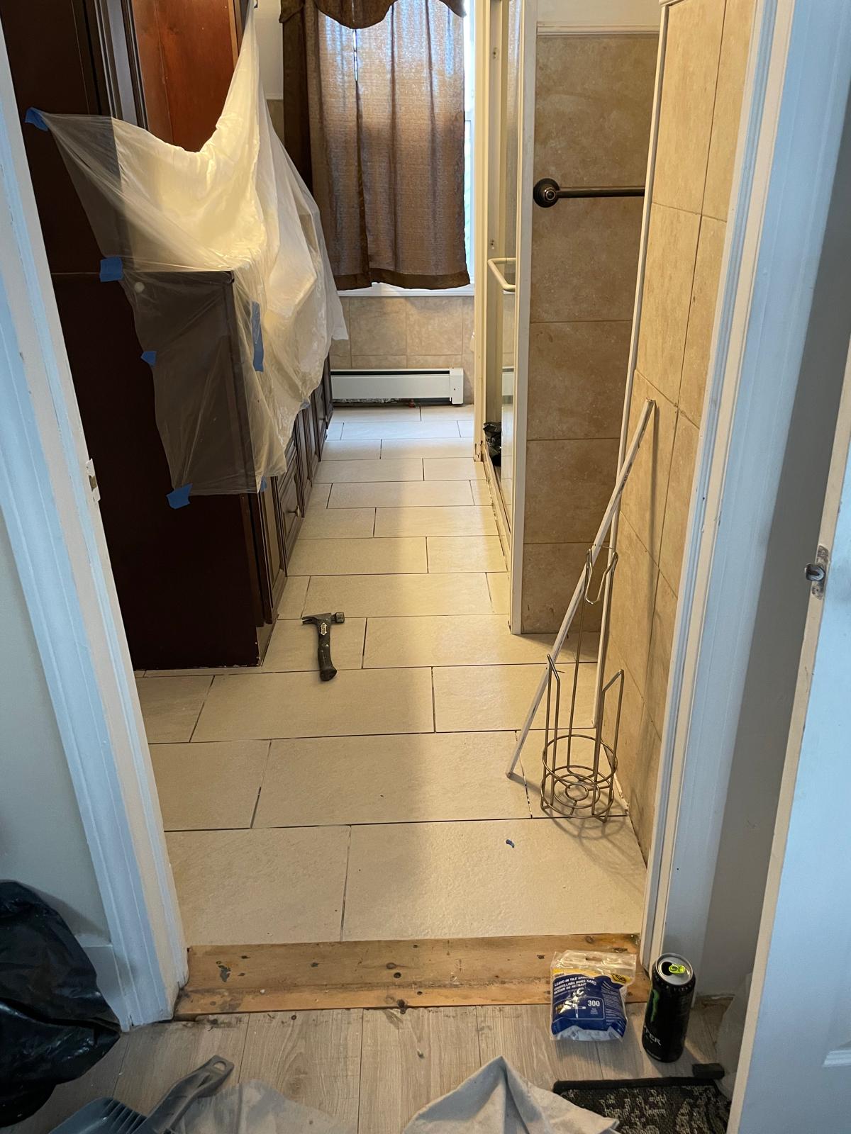 Photo taken after ceramic tile installation completion inside a house by Victor's Finish Work