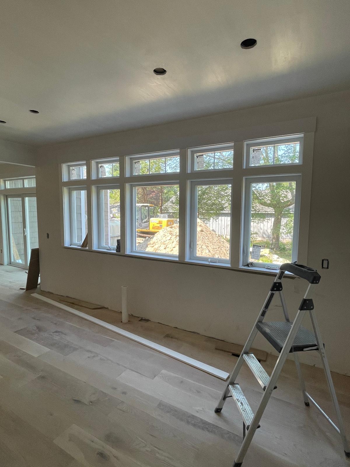 Before and after comparison of exterior trim work - Before image.