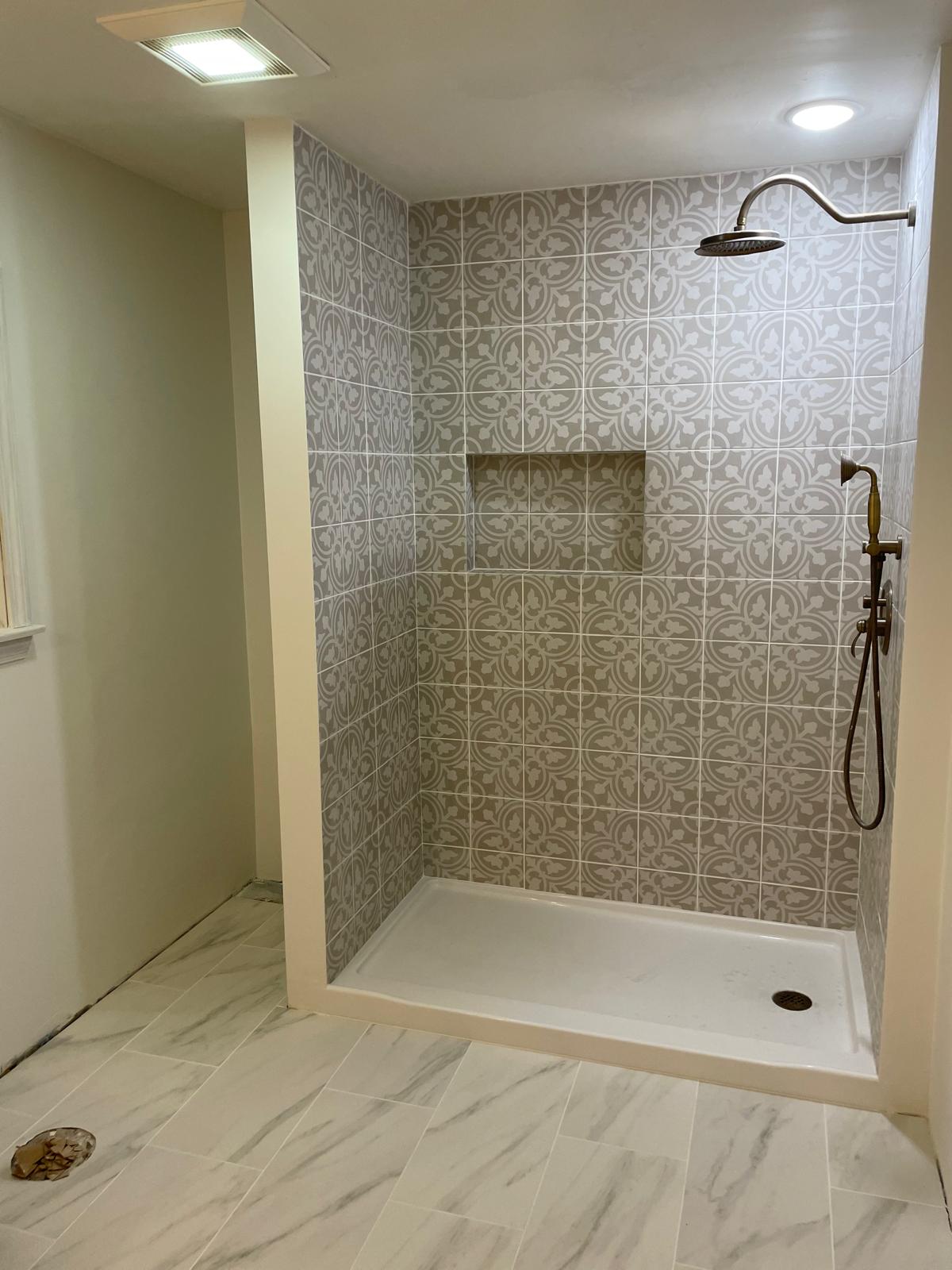 Photo of a bathroom completed by Victor's Finish Work - painting, ceramic tile installation, grouting with excellent finishing