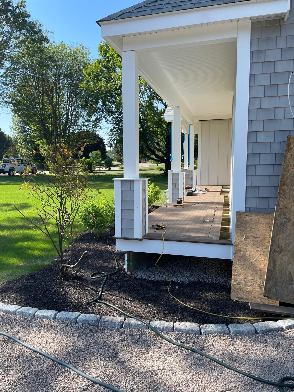 Photo of front porch with deck installation by Victor's Finish Work - excellent results