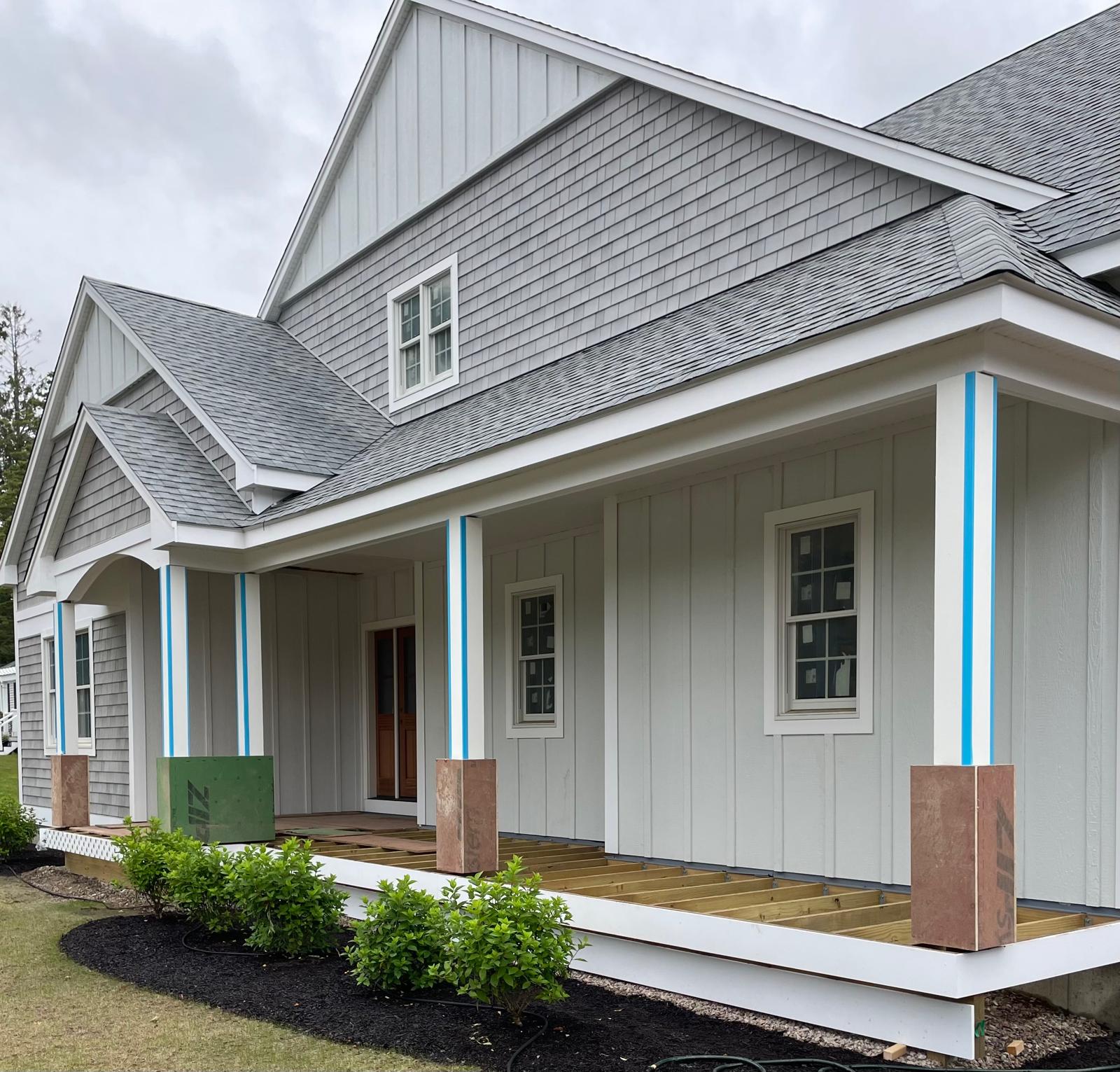 Photo of front porch with deck installation by Victor's Finish Work - excellent results